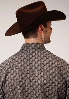 Western Style Long Sleeve One Point Front and Back Yokes Patch Pockets and Flaps Cotton/Poly Fabric Printed with Allover or Wallpaper Stripe Florals 3 Snap Shaped Barrel Cuff 55% Cotton / 45% Polyester Introducing the Roper Tear Drop Print Men's Shirt, a captivating fusion of style and sophistication. This shirt boasts a unique tear drop print design that adorns the fabric, creating a visually striking pattern that sets it apart from the ordinary. The tear drop design, seen all over the shirt, adds a touch of artistic flair and individuality, making it a standout piece in any wardrobe. Crafted with attention to detail and quality, the Roper Tear Drop Print shirt offers both style and comfort. Perfect for any occasion, whether you're dressing up for a night out or keeping it casual for a da Wallpaper Stripe, Åland Islands, Drop Design, Cook Islands, Western Shirt, Isle Of Man, Cayman Islands, Western Shirts, Tear Drop