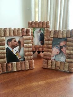 two frames made out of wine corks on a table