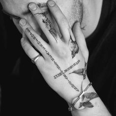 a man holding his hand to his face with birds on it and the words unknown here written below him