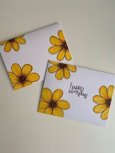 two greeting cards with yellow flowers on them, one has the words happy birthday written on it