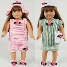 two dolls in crocheted clothes and hats, one is holding a purse while the other is wearing sandals