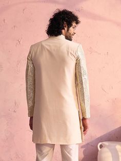 Vastramay Men's Cream Georgette Sherwani Only Top Enhance your ethnic charm with the Vastramay Men's Cream Georgette Sherwani Only Top. Crafted from premium georgette, it offers a blend of sophistication and tradition. Perfect for weddings or special occasions, this sherwani top exudes elegance and comfort. Features Premium georgette fabric Elegant cream color Perfect for traditional occasions Specifications Color: Cream Material: Georgette Available Sizes: S, M, L, XL Material & Care Georgette Men Cream, Top 40, Georgette Fabric, Ethnic Style, Hot Outfits, Packaging Labels, Intricate Design, Ethnic Fashion, Cream Color