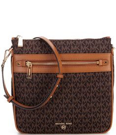 From Michael Kors, the Jet Set Signature Logo Charm Large North South Crossbody Bag features:Nylon18k hardwareZip closureInterior: 1 back zip pocket, 1 front slip pockets Exterior: 1 back snap pocket, 1 front zip pocketAdjustable, removable strapApprox. 9.75" W x 9.25" H x 2.5" D bag; 21" - 23" strap drop Approx. weight 0.75 lb. Imported. Michael Kors Crossbody Bag With Leather Trim, North South, Kors Jet Set, Dillard's, Signature Logo, Michael Kors Jet Set, Jet Set, Michael Kors Monogram, Cross Body Handbags