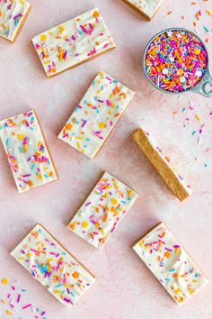 white chocolate with sprinkles next to a spoon