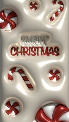 some candy canes are in the shape of christmas letters on a white background with red and white swirls