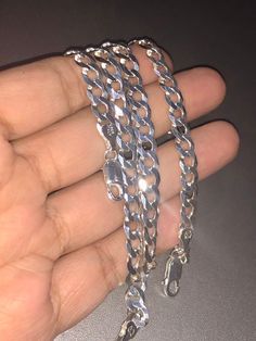 This men’s 6mm-wide diamond-cut solid Cuban link chain necklace crafted in sterling silver measures 22.0 inches in length and secures with a lobster claw clasp. Not plated not cheap not hollow Not refundable Last set Unbeatable Huge sale Comes with certificate of authenticity card Beautiful gift wrapping included Led box included Best gift Hurry don’t miss out! Ready to ship today Bracelet and chain included! Silver Cuban Link Necklace With Curb Chain As Gift, Silver Cuban Link Necklace With Figaro Chain As Gift, Silver Cuban Link Necklace Gift, Silver Cuban Link Necklace As Gift, Silver Cuban Link Necklace With Curb Chain For Anniversary, Sterling Silver Link Bracelet With Curb Chain As Gift, Silver Diamond Cut Cuban Link Necklace, Silver Diamond-cut Cuban Link Necklace, Sterling Silver Cuban Link Necklace Gift