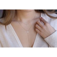 Our Feminine lariat necklace features three 0.08 Ctw VS quality round brilliant cut diamonds vertically bezel set with a 1.25" bar at the bottom for a 3.25" total drop of a sturdy 1.3mm cable chain and spring clasp for additional security all in 14K solid gold for everyday layering. ✨ Features ✨ • Ready To Ship. • Made in the USA.• Gold : Solid 14K• Choice of Gold: Yellow Gold, White Gold• Gem Stone: Genuine and Natural White Diamond• Diamond Cut: Round • Number of Stones: 3• Length: 16" and 18" Minimalist Lariat Diamond Necklace As Gift, Minimalist Diamond Lariat Necklace For Gifts, Minimalist Lariat Diamond Necklace For Gift, Minimalist Diamond Lariat Necklace, Minimalist Lariat Diamond Necklace, Lariat Backdrop Necklace With Diamond Accents As A Gift, Fine Jewelry Lariat Necklace With Single Cut Diamonds, Dainty Diamond Backdrop Necklace As Gift, Dainty Diamond Backdrop Necklace Gift