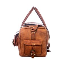 Trustpilot This weekender duffle bag has four big pockets in the exterior with buckle closure. This travel bag is made of genuine goat leather which gives it a rustic look which is for everyone who is looking for something heavy-duty but with good looks. This bag has three compartments, one big compartment for all your clothes and shoes, two small compartments with a zipper for all of your accessories. Salient Features Color: Light Brown Heavy handle and adjustable shoulder strap Genuine goat le Vintage Travel Bag With Multiple Pockets, Rectangular Travel Bag With Multiple Pockets, Rectangular Duffle Bag With Pockets For Trips, Rectangular Weekender Bag With Pockets For Trips, Rugged Rectangular Bags For Adventure, Rugged Rectangular Bag For Adventure, Rugged Adventure Bag With Pockets, Rugged Rectangular Adventure Bags, Rugged Large Capacity Rectangular Travel Bag