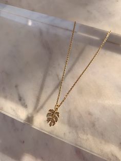 * Dainty cubic zirconia monstera leaf necklace * 24k gold filled customizable chain options * Handmade in SB, California * Expected shipping 4-7 business days Palm Necklace, Tropical Necklace, Palm Tree Pendant, Tropical Jewelry, Necklace Layered, Tarnished Jewelry, Jewelry Minimalist, Tree Pendant, Layered Jewelry