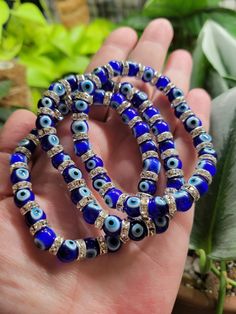 "This listing is for ONE (1) 8mm glass bead Evil Eye bracelet.  These are heavy, weighted glass beads and high quality Austrian Crystal Spacers. They are as much an amazing tactile experience as they are a Spiritual one.  The Nazar is intended to ward off the \"Evil Eye\" which is not always something someone knows they are sending. it has a rich history in many cultures from the Middle East and Mediterranean. Use it for protection, hex breaking and warding. Fits up to an 8 inch wrist & made wit Spiritual Evil Eye Bracelet With 8mm Beads, Glass Bead Jewelry With 8mm Beads, Glass Beads Jewelry, 8mm Size, Glass Beads Jewelry 8mm Round, Glass Jewelry With 8mm Round Beads, Hex Breaking, Nazar Bracelet, Bead Evil Eye, Turkish Evil Eye