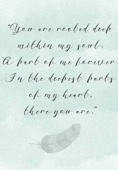 a poem written in cursive writing with a feather