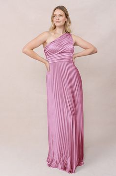 Model: Sydney; Size: 10; Color: Mauve Pink Pre-draped One Shoulder Dress For Prom, Pre-draped Bridesmaid Dress With Asymmetrical Neckline, Pre-draped One Shoulder Ruched Evening Dress, Pre-draped One Shoulder Pink Dress, Draped Dresses With Pleated Bodice For Bridesmaids, Bridesmaid Dress With Pleated Bodice And Draped Shape, Pre-draped One Shoulder Dress For Spring, One Shoulder Dress With Ruched Bodice For Gala, One Shoulder Ruched Maxi Dress For Gala