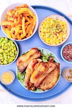 a blue plate topped with different types of food