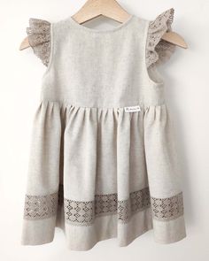 Cotton-linen blend dress Johanna * Drop waist * Lace details * Free fit * Material: 70% cotton; 30% linen / Lace: 100% Linen (OEKO-TEX Certificate) You may also like: https://muulin.com/collections/girls/products/dress-johanna-lina Beige Linen Dresses With Lace Trim, Beige Linen Dress With Lace Trim, Beige Cotton A-line Dress, Cotton Flutter Sleeve Dress With Lace Trim, Beige A-line Cotton Dress, Cotton Dress With Lace Trim And Flutter Sleeves, Beige Cotton Dresses With Lace Trim, Beige Cotton Dress With Lace Trim, Sleeveless Linen Dress With Lace Trim