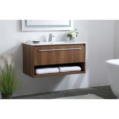 Save space and make your bathroom appear bigger with this floating vanity. Engineered with a durable resin countertop, this vanity features brushed nickel finish hardware and is crafted from MDF. Resin Countertops, Vanity Tops, Floating Vanity, Home Improvement Store, Single Bathroom, Vanity Top, Single Bathroom Vanity, Bathroom Vanities, Bathroom Fixtures