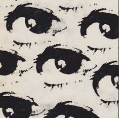 black and white drawing of eyes with tears all over the entire face, on a sheet of paper