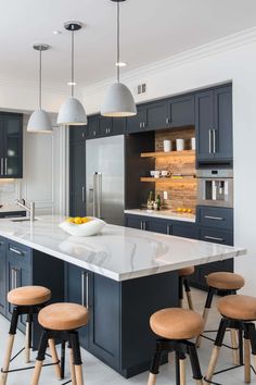 an image of a kitchen setting with stools