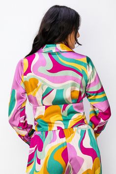 • SKU: T-5169• S-M-L• Hand wash only• Elevate your style with our Vibrant Multi-Color Long Sleeve V-Neck Blouse featuring a chic collar and button closure. • This eye-catching blouse showcases a dynamic blend of colors, adding a playful and stylish touch to your outfit. With its comfortable long sleeves and versatile design, it's the perfect choice for both casual and semi-formal occasions. Green V-neck Top With Vibrant Print, Vibrant Print V-neck Top For Brunch, Trendy V-neck Top With Vibrant Print, Trendy V-neck Tops With Vibrant Print, Multicolor V-neck Top For Brunch, Vibrant Print Multicolor V-neck Top, Colorful V-neck Tops With Vibrant Print, Green V-neck Top For Brunch, Trendy Multicolor V-neck Blouse