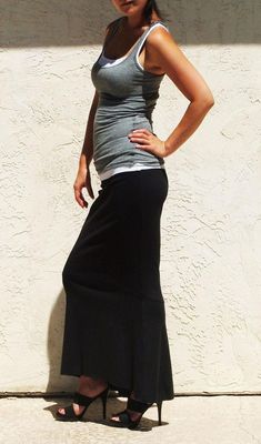 "Mermaid long skirt in figure flattering silhouette This maxi skirt is designed to fit from waist to knees and flares to hem We have only a few left -Made of high quality stretch interlock knit jersey -Fitted fit through knees and A-line silhouette to ankle -Slight high low hem -Elastic waist for easy pull on -Waist sits below naval Is your measurements off sizes? Please ask us about custom skirt. There will be additional charge for custom order. Please inquire via message *Model is 28\" waist, Chic Full-length Stretch Skirt, Chic Full Length Stretch Skirt, Chic Stretch Full-length Skirt, Chic Non-stretch Full-length Skirt, Casual Stretch Full Length Maxi Skirt, Casual Stretch Full-length Maxi Skirt, Stretch Casual Maxi Skirt, Casual Fitted Flared Maxi Skirt, Fitted Full-length Maxi Skirt