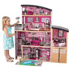 Our KidKraft Sparkle Mansion Dollhouse is a glamorous and modern take on traditional play. Standing over four feet tall, this dollhouse features six rooms and two outdoor spaces including a balcony and expanded backyard complete with swimming pool. A gliding elevator brings dolls from the first floor to the second, and the attached garage features doors that open and close. The included 30-piece hand-painted accessory kit features modern-looking appliances and furniture, including two pieces wit Best Doll House, Barbie Doll House, Multiplication For Kids, Wooden Dollhouse, Barbie Dream, Barbie Dream House, Wooden Dolls, Doll Furniture, Barbie Doll