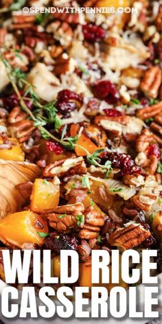 wild rice casserole with cranberries and pecans in the background text reads wild rice casserole