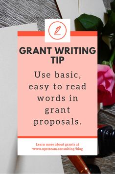 an orange sign that says grant writing tip use basic, easy to read words in grant prop