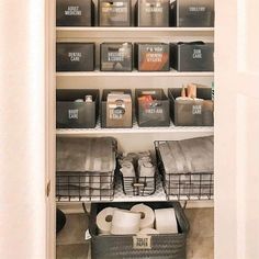 an organized pantry with toilet paper and other items