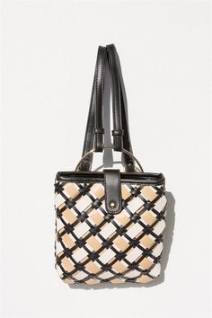 *THIS IS A FINAL SALE ITEM* Exclusively designed by Sabo, the Lattice Mini Backpack is made from a woven vegan leather in off white, beige and black hues. It features a gold toned ring handle at top, adjustable straps and magnetic snap button closure. Chic Backpack With Leather Handles, Ring Handle, Beige And Black, Mini Backpack, White Beige, Michael Kors Monogram, Lattice, Snap Button, Sale Items