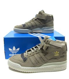 Adidas Forum Mid Men's size 6 Clay Gray Leather Athletic Casual Shoes HQ1508 They run on the narrow side. Check pics prior purchase please. Features Genuine leather upper Detail stays true to the OG Basketball Icon Lace-up closure w/ hook & loop strap Ankle removable, adjustable strap Iconic logo in gold Rubber outsole for grippy traction Adidas Forum Mid, Basketball Icon, Athletic Models, Adidas Forum, Iconic Logo, Gray Leather, Grey Leather, Casual Shoes, Athletic Shoes