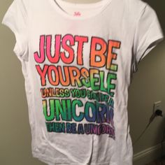 New White T-Shirt By Justice For Big Girls. “ Just Be Yourself Unless You Can Be A Unicorn. Then Be A Unicorn.” Size 14. (626) Spring List, Scene Clothes, Justice Clothes, Justice Clothing Outfits, Justice Store, Summer List, School Clothing, Christmas Haul, Just Be Yourself