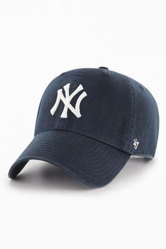 Cotton baseball cap by '47 brand. Structured 6-panel fabrication and topped with a New York Yankees logo to the front. Includes an adjustable closure at the back and finished with a curved brim. Boston-based '47 Brand was founded in 1947 by twin brothers that grew their business from a single street cart to a premier sports lifestyle brand with a unique mix of headwear and apparel. Content + Care. 100% Cotton Spot clean Imported Size + Fit. Adjustable circumference Yankee Hat, Yankees Baseball Cap, New York Yankees Logo, Yankees Hat, Yankees Logo, Yankees Baseball, Cute Spring Outfits, Ny Yankees, Athleisure Fashion