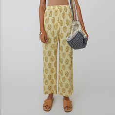 Pernelle Floral Print Twill Straight Leg Size 32 New With Tags Never Worn Chic Yellow Loungewear Pants, Chic Yellow Lounge Pants, Fitted Yellow Pants For Vacation, Spring Lemon Print Bottoms, Yellow Relaxed Fit Pants For Spring, Chic Yellow Summer Pants, Casual Bottoms With Lemon Print For Spring, Mustard Cotton Pants For Summer, Casual Lemon Print Bottoms For Spring