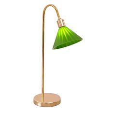 a green lamp on a gold base with a dimmer light in the middle and a white background