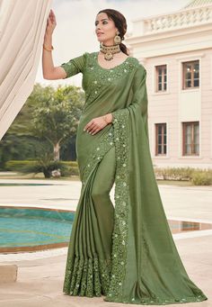 Olive green silk festival wear saree 6604  Desc:  Color : Olive Green Fabric : Silk Work : Embroidery Wash Care : Dry clean Sleeve Style : Half Sleeve Long Sleeves : Done only in Custom Stitch Sleeves Lining : Done only in Custom Stitch Bust Size : 32 to 42 Inches Occasion : Festival   Christmas   Diwali   Kitty Party   Party Wear   Ceremonial   Marriage Anniversary. With Express Free Shipping and Custom Stitching, Buy Indian Wedding Party Wear Saree Olive green silk festival wear saree 6604 onl Green Sari, Classic Saree, Indian Designer Sarees, Designer Silk Sarees, Saree Design, Embroidered Art, Master Piece, Green Saree, Embroidery Saree