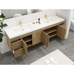 This wall-mounted double vanity adds a modern look to your bathroom or powder room with its sleek, floating design and glossy finish. It's crafted from engineered wood, and it features an acrylic countertop with two rectangular sinks. Two shelved cabinets beneath the sinks provide ample space for toilet tissue and cleaning supplies. Plus, its four soft-close drawers are great for holding toiletries and bathroom must-haves. This vanity arrives fully assembled, so it's ready for installation and p Acrylic Countertop, Free Standing Vanity, Toilet Tissue, Double Bathroom, White Countertops, Double Bathroom Vanity, Bathroom Vanity Set, Home Improvement Store, Soft Close Drawers