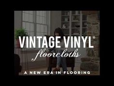 a woman sitting in a chair with the words vintage vinyl floorcloths on it