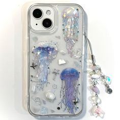 an iphone case with jellyfish and other sea creatures