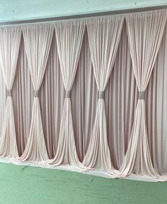 an image of a room setting with drapes on the wall