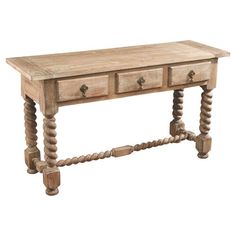 an old wooden table with two drawers on one side and roped ends on the other