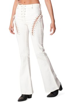 Dramatic high-rise flares get a flirty touch from lace-up ties fastening the front and flaunting some skin at each leg. 45% cotton, 45% polyester, 10% spandex Machine wash, tumble dry Imported White Lace Jeans, White Flare Pants, High Waist Flare Jeans, White Flared Jeans, Country Style Outfits, White Flares, Cute Pants, Denim Patterns, Swimwear Dress