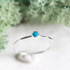 Tiny skinny stackable ring with beautiful bright blue turquoise stone (Country of Origin US). It is made with a skinny but sturdy band, which allows you to create mind-blowing stacking sets! The ring is ideal for everyday wear and it will also look amazing with a festive dress. The ring is 0,8-0,9 mm thick and looks very dainty on the finger. Choose the size of the stone (3 or 5 mm) and the material for the ring (sterling silver or 9k gold). If you want to change the ring band design or get a cu Festive Dress, Band Design, Stackable Ring, December Birthstone, Festival Dress, Ring Band, Mind Blowing, Slovakia, Blue Turquoise