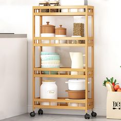 a wooden shelf filled with lots of dishes and containers next to a white bag on the floor