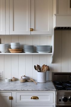 the kitchen counter is clean and ready to be used for cooking or serving dishes on it