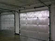 an overhead garage door is shown in this image, it looks like the inside of a building