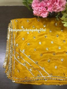 Custom made dupatta perfect for all festive and wedding occasions and goes with anarkali suits And lehenga choli Note: The shipping will be through FedEx or DHL. Manufacturing time- 7 days. Unstitched Dola Silk Dupatta With Dabka Work, Gold Sharara With Zari Work For Festivals, Festival Gold Dola Silk Sharara, Gold Sharara With Traditional Drape For Festivals, Gold Chanderi Choli For Festivals, Gold Dola Silk Lehenga With Dupatta, Gold Chanderi Lehenga With Gota Work, Gold Dola Silk Lehenga With Dori Work, Gold Dola Silk Lehenga For Festivals