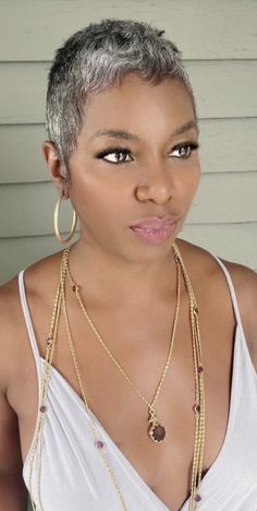 Short Natural Gray Hairstyles, Gray Pixie Haircut Black Women, Gray Pixie Haircut Over 50 Black Women, Short Gray Hair Styles For Black Women Over 60 Grey, White Tinted Short Hair For Black Women, Short Salt And Pepper Hair Black Women, Platinum Gray Hair On Black Women Wig, Salt And Pepper Pixie Haircut, Short Grey Hair Black Women