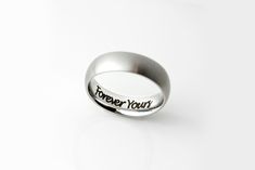 A classic! This mens ring can be engraved on the outside or inside with a short message, a name, or even an anniversary date for a small reminder of all the sweet things in life. Anniversary Silver Rings With Laser Engraving, Silver Laser Engraved Rings As Gift, Promise Rings For Him, Promise Rings For Guys, Custom Matches, Papa Gifts, Personalized Fathers Day Gifts, Engraved Ring, Short Message