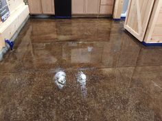 a kitchen floor that has been stained brown