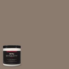 a jar of dymasty colorante on a gray background