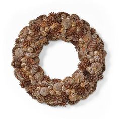 a wreath made out of pine cones on a white background